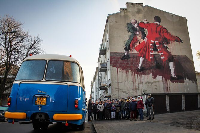 Discover the Dark Side of Warsaw in Praga District by Retro Bus - Where you start at Pałac Kultury i Nauki (and why that location matters)