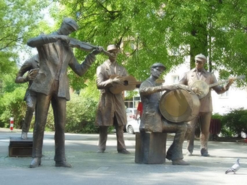 Warsaw: 2-Hour Praga Walking Tour - Rozycki Bazaar, Praga Street Band, and the neighborhood’s trade energy
