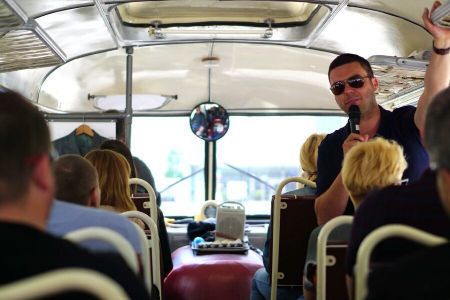 Warsaw: Highlights Guided Retro Bus Tour - Old Town by bus: how the rebuilt city gets explained