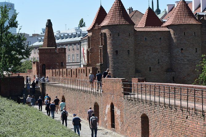 Warsaw Old Town Guided Tour with Antek & Friends | small groups - Warsaw Ghetto boundary markers: history with real gravity