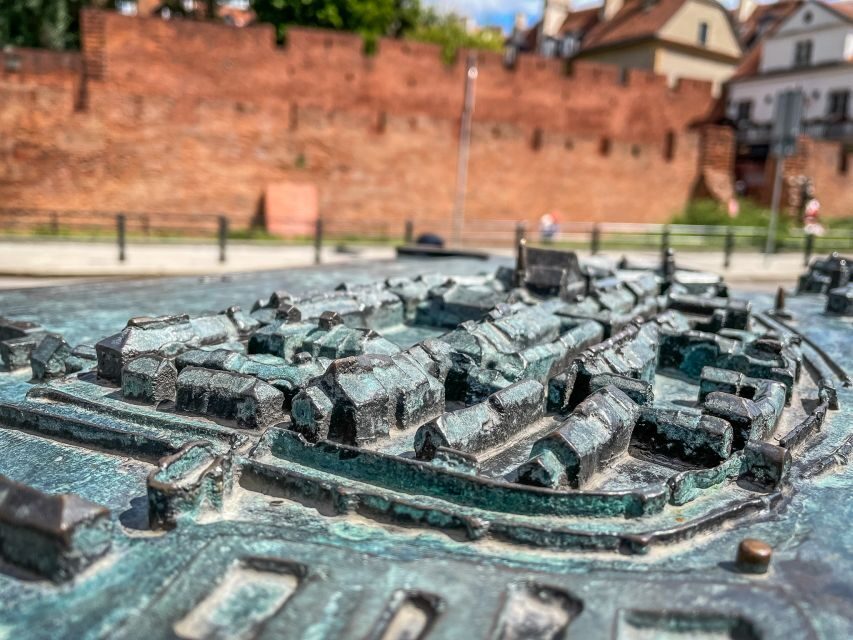Warsaw: Old Town Highlights Walking Tour in English - Krakowskie Przedmieście colors and the Old Town that feels enclosed