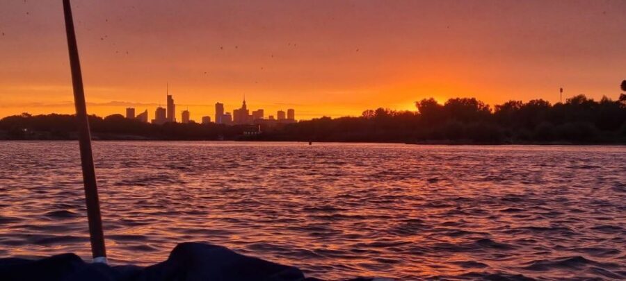 Warsaw: Vistula River Sunset Cruise with Welcome Drink - The Wooden Boat Setup: Indoor Decks, Blankets, and Power